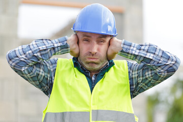 construction suffering from noise pollution on building site