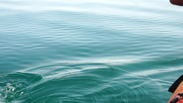 Kayak paddle calm water, serene ocean kayaking on beautiful clear turquoise sea during tranquil summer recreation sport