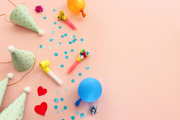 party background with hat, confetti, balloons