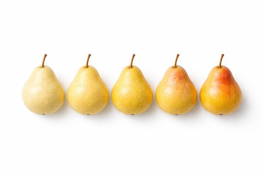 Yellow pear cut open with melon baller scoop removed and corer tool meal prep concept isolated on white