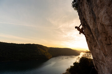 Climbing session in Istria Croatia near sunset with a view of the water and hills © prelevicm