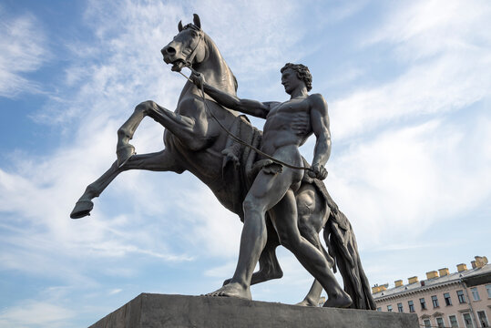 SAINT PETERSBURG, RUSSIA - JUNE 02, 2024: Sculpture "Horse with walking youth" on Anichkov Bridge. Saint Petersburg