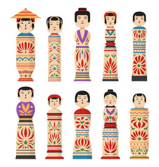 A set of traditional Japanese wooden kokeshi dolls. The dolls feature a variety of patterns and colors, showcasing traditional design in a clear and simple form.