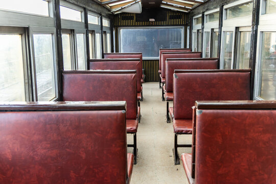 indian railway heritage vista dome passenger coach with red seats and wooden ceiling