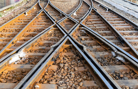 railway track junction with multiple rail lines intersecting