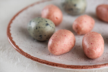 Marzipan Easter eggs on a plate. Vegan candy. Sugar, gluten and lactose free.
