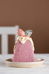 Paskha vegan cottage cheese, Easter dessert made with almond ricotta, strawberries, icing, and marzipan eggs.