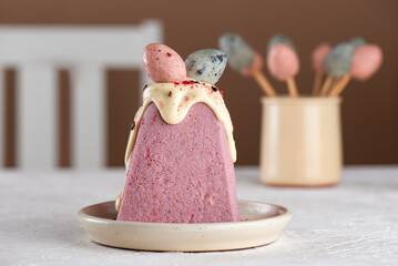 Paskha strawberry cottage cheese with marzipan eggs. Traditional Easter dessert. Healthy food.