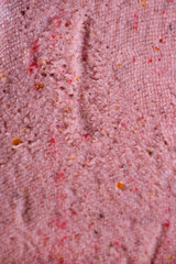 Close-up background of Paskha cottage cheese with strawberries. Traditional Easter dessert. Vertical orientation.