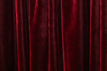 Luxury Dark Red Velvet Curtain with Vertical Folds and Soft Texture