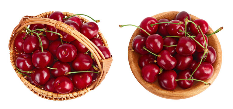 red sweet cherry in wicker basket and wooden bowl isolated on white background with full depth of field, Top view. Flat lay