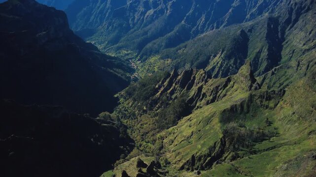 4K Cinematic Drone Tilt Up Reveal of Madeira Mountains: From Lush Valleys to Blue Horizon Peaks, Epic Landscape Panorama with Curral das Freiras, Vast Central Massif View, Atmospheric Shot