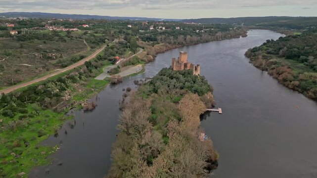 Aerial view of Almourol Castle on a river island, Portugal, serene mood