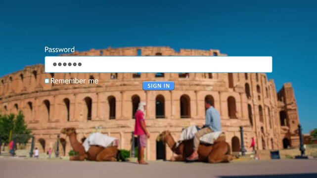 A person types a password into a website form on a computer while the El Jem Colosseum stands in the background. The activity takes place during daylight.