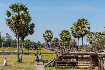 Angkor Wat, Cambodia, The complex grounds with hundreds or tourists showing many temple buildings