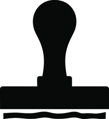 A black rubber stamp with a wavy pattern on its face is shown from a front view