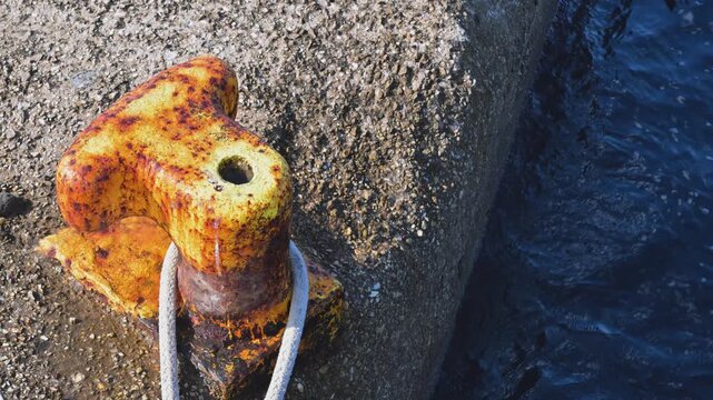 Rusty Ship Mooring in Yellow and Orange on Tilos, Greece