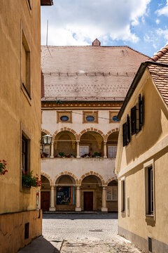 Picturesque glimpse of the Prince&rsquo;s Mansion, house of the Celje Regional Museum, seen from Ulica Ivanke Uranjekove alley, cultural landmark in Celje, Slovenia