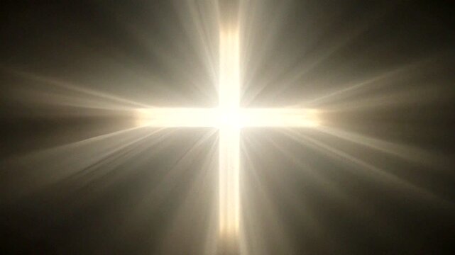 Glowing cross shape with radiant light beams in a dark abstract background evokes a serene atmosphere.