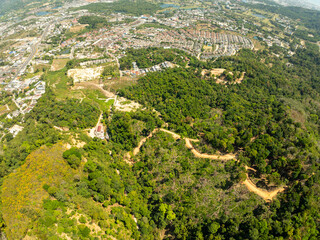Aerial view drone photography High angle view of Phuket city near the sea, Phuket province Thailand, Panorama of phuket city thailand in sunny day