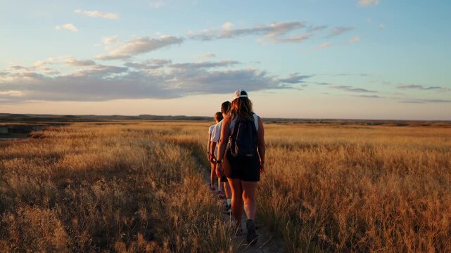 Family walking together active outdoors in nature