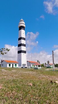 Mandacaru Lighthouse At Barreirinhas Maranhao Brazil. Birds Eye View Of Lighthouse Standing Tall Against The Blue Sky. Landscape Dramatic Sky Waterfall Tropical. Mountain Powerful Flow.