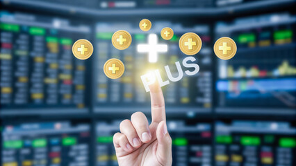 financial capital optimization. A hand is pressing a glowing plus sign icon on a digital screen with financial data and charts in the blurred background.