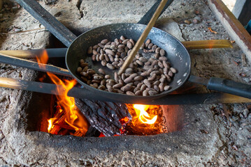 Roasting cocoa beans in the Cuyabeno Amazon Reserve, Ecuador