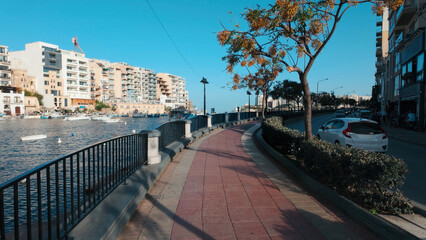 Obraz premium St Julian’s Bay(San Giljan) and Urban Waterfront, Malta on sunny day