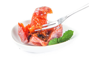 Fresh Cut Persimmon with Fork on White Plate © DoThi