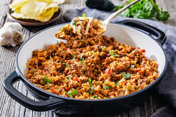 Texas hash of beef pepper onion tomato and rice