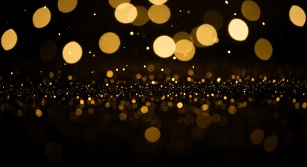 Golden bokeh lights on black.