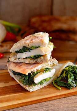 Neapolitan panuozzo sandwich with friarielli and provola cheese