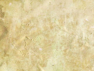 Antique vintage old paper texture background with yellowed weathered stains and crumpled parchment surface for retro design scrapbooking and historical concept