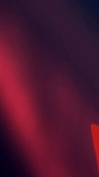 Red Diamond Shape Abstract Background with Light Rays and Particles