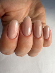 Nude Gel Nail Polish. Beige Manicure.