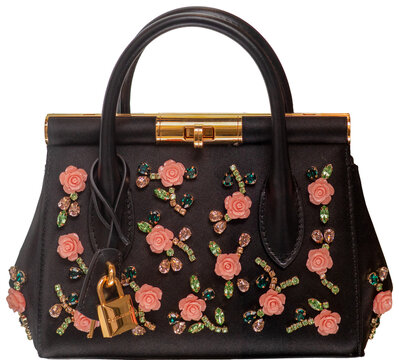 Marlene by Dolce & Gabbana, black fabric handbag with rose-shaped floral embroidery, crystals and padlock. Milan - Italy, 10 February 2026