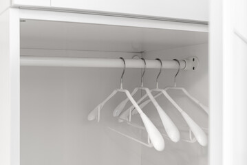 Wardrobe hangers close up