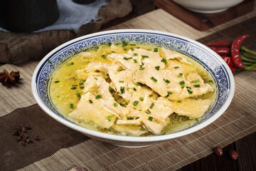 Traditional Asian Tofu Soup with Fresh Garnish