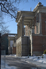Fototapeta premium profile perspective view of Osgoode Hall, law offices and courts, located at 130 Queen St W, viewed from the eastern edge, Toronto