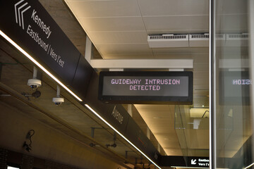 Fototapeta premium Guideway Intrusion Detected sign inside Kennedy station of the Eglinton Line 5, Toronto