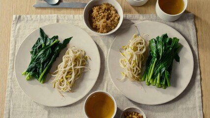 Healthy vegan breakfast set for two with greens and sprouts