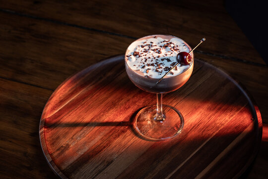 Valentines Day Chocolate Martini with a cherry shot using dramatic lighting