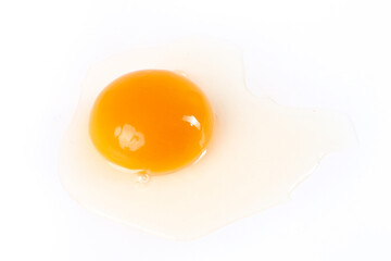Fresh Raw Egg with Bright Orange Yolk on White Background