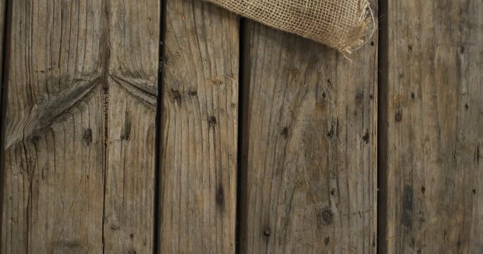 Video of rosemary twig and spoon of salt on wooden background