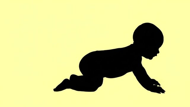 Crawling baby silhouette on pale yellow background