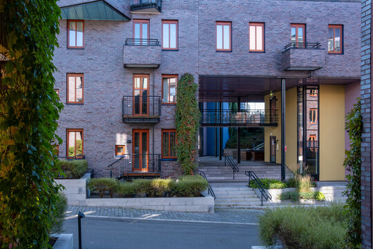 modern apartment facade in Oslo Norway with residential architecture balcony entrance and window pattern showing clean urban design and building frontage