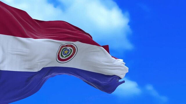 Paraguay national flag waving in the wind against blue sky patriotic animation