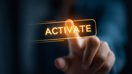  a businessman's finger about to press glowing "ACTIVATE" text