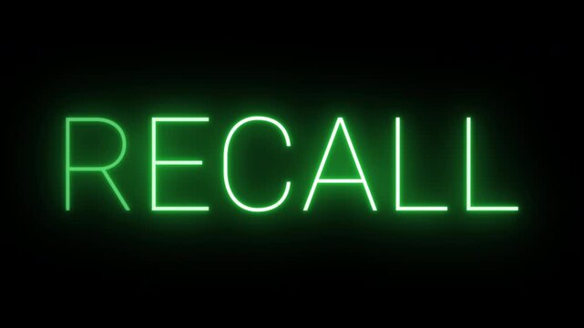 Flickering neon green glowing recall sign animated black background.